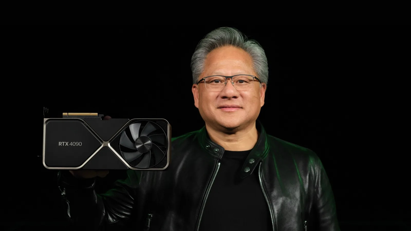 Nvidia CEO Jensen Huang holding a graphics card
